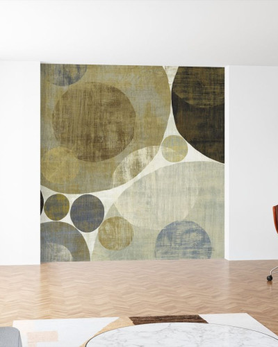Wallpaper abstract cu cercuri suprapuse, in nuante de verde si albastru, montat pe un perete din living