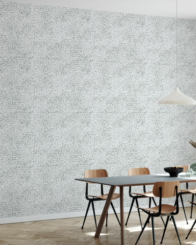 Tapet cu model subtil de puncte verzi pe fond alb, în amenajarea unui living modern
