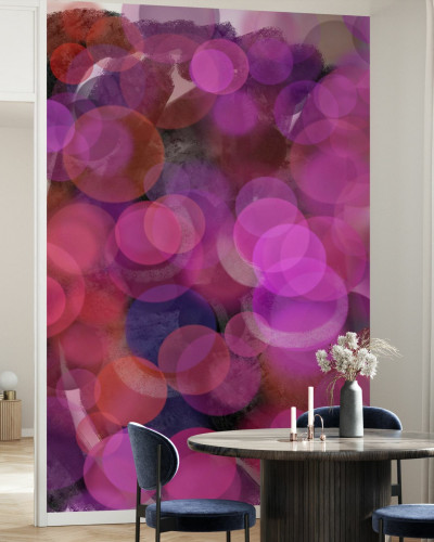 Tapet cu design abstract cu cercuri suprapuse în nuanțe de violet, roz și roșu.