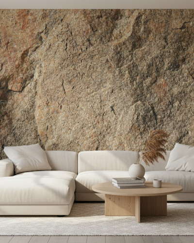 Fototapet Earthen Granite Whisper personalizat, textură detaliată de piatră naturală, într-un living modern cu canapea bej și plante verzi.