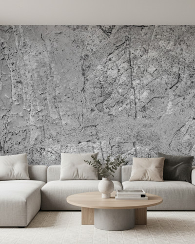 Living modern cu fototapet gri textură piatră Urban Stone Canvas, canapea modulară deschisă la culoare, măsuță de cafea din lemn și beton, și lampadar negru. Camera are un decor minimalist cu perete accent.