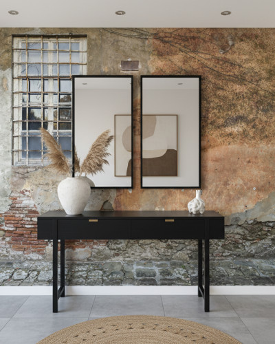 Fototapet Broken Window Grayscale - personalizat, montat pe un perete. Prezintă un design de zid vechi, deteriorat, cu cărămizi expuse și o fereastră industrială cu grilaj, într-un interior modern cu consolă neagră și decorațiuni.