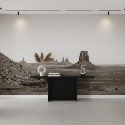 Fototapet personalizat cu peisajul iconic Monument Valley în tonuri sepia, aplicat pe peretele unui restaurant modern, creând o atmosferă unică de aventură.
