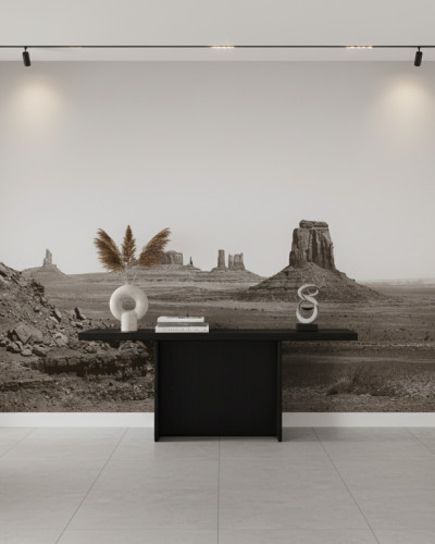 Fototapet personalizat cu peisajul iconic Monument Valley în tonuri sepia, aplicat pe peretele unui restaurant modern, creând o atmosferă unică de aventură.