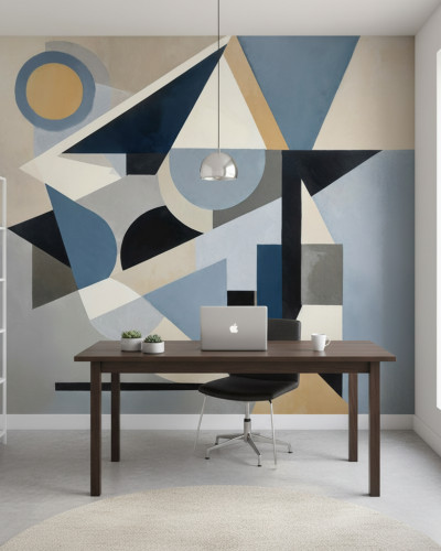 Fototapet cu design geometric abstract în culori albastru, gri și bej, montat pe peretele din spatele unui pat matrimonial.